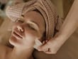 woman in facial treatment massage