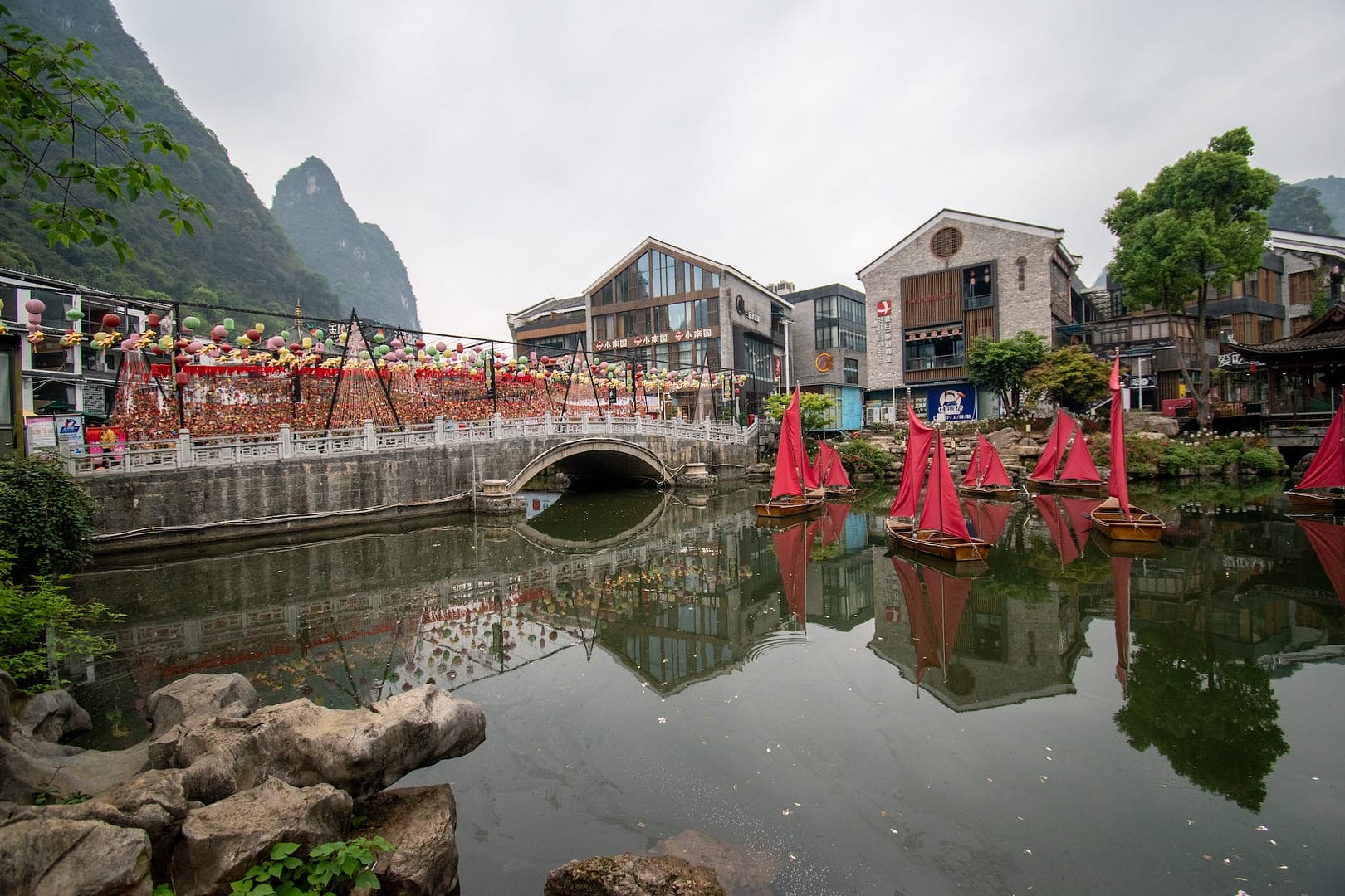 brown and white concrete building near body of water