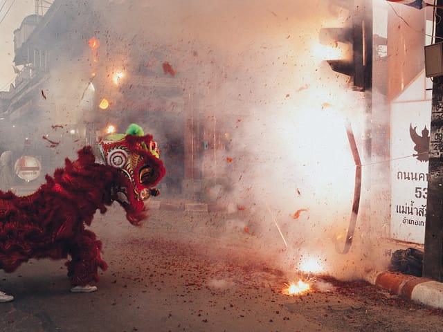 red dragon mascot on the street